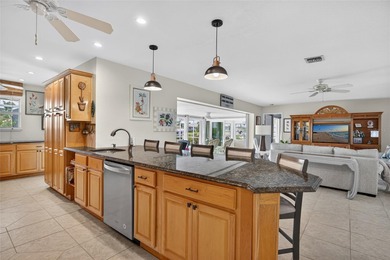 PUNTA GORDA ISLES! BEAUTIFULLY UPDATED 3 BEDROOM, 2 BATH, 2-CAR on Saint Andrews South Golf Club in Florida - for sale on GolfHomes.com, golf home, golf lot