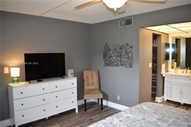 If you've ever felt that life after 55 should be laid back and on Sunrise Lakes Phase IV Golf Course in Florida - for sale on GolfHomes.com, golf home, golf lot