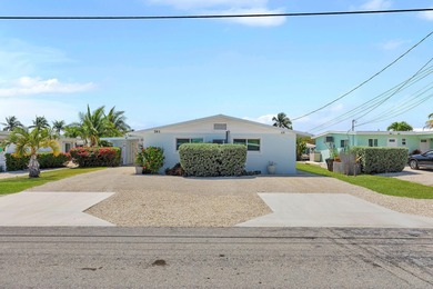 A rare opportunity to own a beautifully maintained piece of on Key Colony Beach Golf Course in Florida - for sale on GolfHomes.com, golf home, golf lot