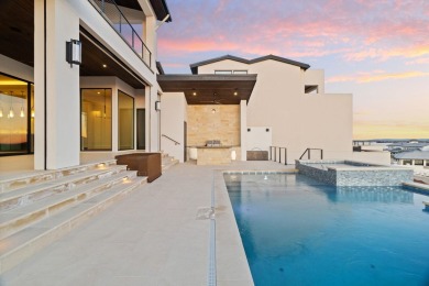 A Contemporary Masterpiece on a Private, Gated Peninsula. This on Apple Rock Golf Course - Horseshoe Bay in Texas - for sale on GolfHomes.com, golf home, golf lot