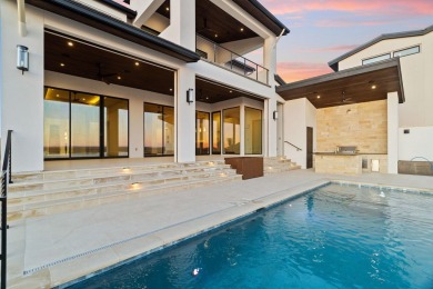 A Contemporary Masterpiece on a Private, Gated Peninsula. This on Apple Rock Golf Course - Horseshoe Bay in Texas - for sale on GolfHomes.com, golf home, golf lot