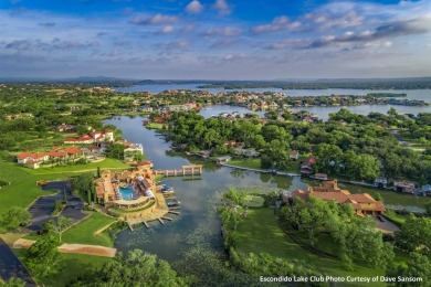 A Contemporary Masterpiece on a Private, Gated Peninsula. This on Apple Rock Golf Course - Horseshoe Bay in Texas - for sale on GolfHomes.com, golf home, golf lot