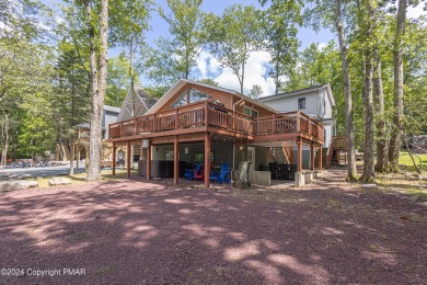 Stunning Lakeview Pocono vacation home nested in popular Lake on Split Rock Resort and Country Club in Pennsylvania - for sale on GolfHomes.com, golf home, golf lot