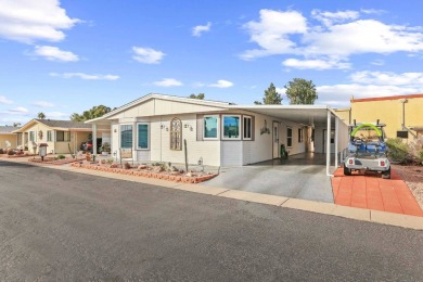 Beautifully remodeled 2-bedroom plus den, 2-bath home with 1,568 on Painted Mountain Golf Club in Arizona - for sale on GolfHomes.com, golf home, golf lot