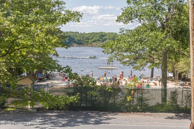 Stunning Lakeview Pocono vacation home nested in popular Lake on Split Rock Resort and Country Club in Pennsylvania - for sale on GolfHomes.com, golf home, golf lot