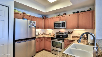 Beautiful two bedroom, two bathroom with den that could easily on Oceans Golf Club in Florida - for sale on GolfHomes.com, golf home, golf lot