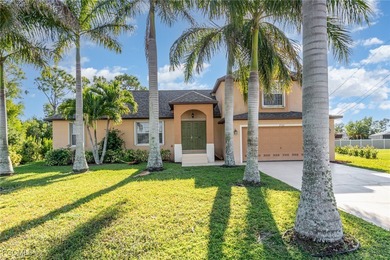 Welcome to your dream home in beautiful Cape Coral, FL! This on Royal Tee Country Club in Florida - for sale on GolfHomes.com, golf home, golf lot