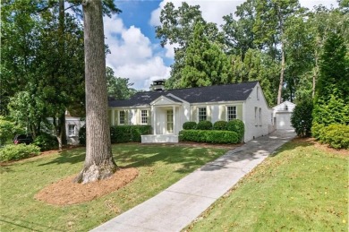 Don't miss this delightful white brick home in the heart of one on Bobby Jones Golf Club in Georgia - for sale on GolfHomes.com, golf home, golf lot