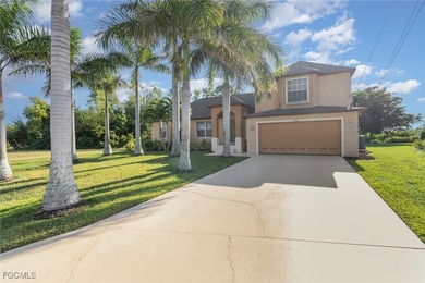 Welcome to your dream home in beautiful Cape Coral, FL! This on Royal Tee Country Club in Florida - for sale on GolfHomes.com, golf home, golf lot