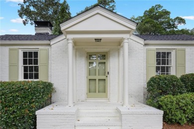 Don't miss this delightful white brick home in the heart of one on Bobby Jones Golf Club in Georgia - for sale on GolfHomes.com, golf home, golf lot