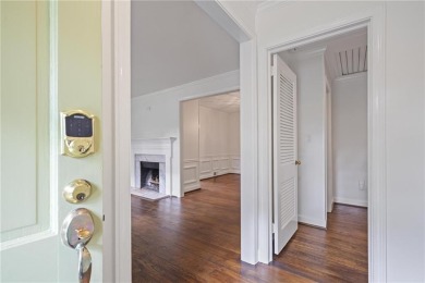 Don't miss this delightful white brick home in the heart of one on Bobby Jones Golf Club in Georgia - for sale on GolfHomes.com, golf home, golf lot