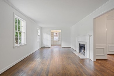 Don't miss this delightful white brick home in the heart of one on Bobby Jones Golf Club in Georgia - for sale on GolfHomes.com, golf home, golf lot