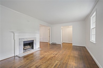 Don't miss this delightful white brick home in the heart of one on Bobby Jones Golf Club in Georgia - for sale on GolfHomes.com, golf home, golf lot
