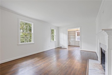 Don't miss this delightful white brick home in the heart of one on Bobby Jones Golf Club in Georgia - for sale on GolfHomes.com, golf home, golf lot
