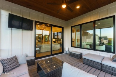Welcome to this stylish executive home located on a 1+ acre lot on Ruggles Ferry Golf Club in Tennessee - for sale on GolfHomes.com, golf home, golf lot