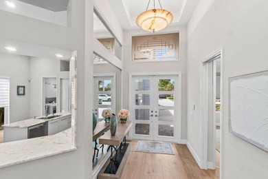 Experience resort-style living in this stunning single-story on Addison Reserve in Florida - for sale on GolfHomes.com, golf home, golf lot