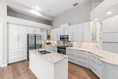 Experience resort-style living in this stunning single-story on Addison Reserve in Florida - for sale on GolfHomes.com, golf home, golf lot