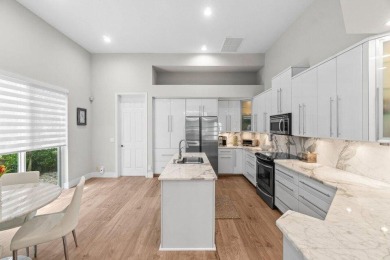 Experience resort-style living in this stunning single-story on Addison Reserve in Florida - for sale on GolfHomes.com, golf home, golf lot