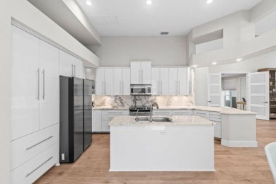 Experience resort-style living in this stunning single-story on Addison Reserve in Florida - for sale on GolfHomes.com, golf home, golf lot