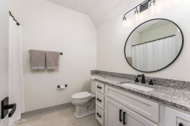 Welcome to this stylish executive home located on a 1+ acre lot on Ruggles Ferry Golf Club in Tennessee - for sale on GolfHomes.com, golf home, golf lot