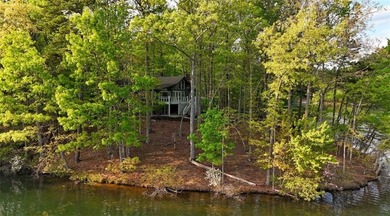 OVER 550 FEET OF SHORELINE! This is a fabulous opportunity to on Big Canoe Golf Club - Cherokee in Georgia - for sale on GolfHomes.com, golf home, golf lot