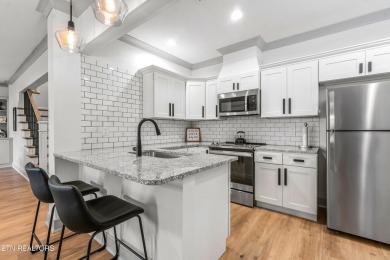 Welcome to this stylish executive home located on a 1+ acre lot on Ruggles Ferry Golf Club in Tennessee - for sale on GolfHomes.com, golf home, golf lot