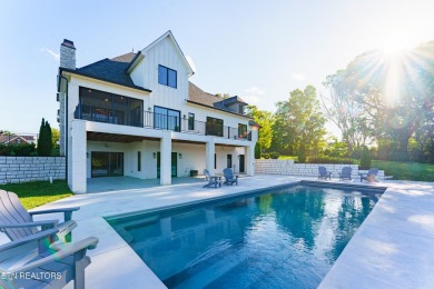 Welcome to this stylish executive home located on a 1+ acre lot on Ruggles Ferry Golf Club in Tennessee - for sale on GolfHomes.com, golf home, golf lot