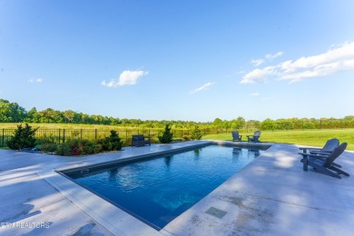 Welcome to this stylish executive home located on a 1+ acre lot on Ruggles Ferry Golf Club in Tennessee - for sale on GolfHomes.com, golf home, golf lot