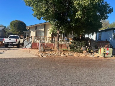 This home has three bedrooms, two bathrooms, a family room and a on The Club at Copper Valley Golf Course in California - for sale on GolfHomes.com, golf home, golf lot