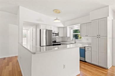 Tropical oasis in Northeast Park Shores! Two bedroom, two bath on The Renaisssance Vinoy Golf Club in Florida - for sale on GolfHomes.com, golf home, golf lot