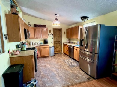This home has three bedrooms, two bathrooms, a family room and a on The Club at Copper Valley Golf Course in California - for sale on GolfHomes.com, golf home, golf lot