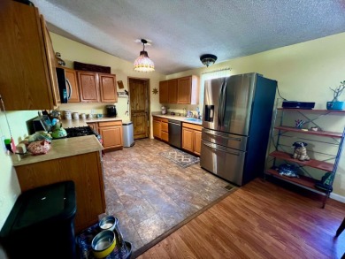 This home has three bedrooms, two bathrooms, a family room and a on The Club at Copper Valley Golf Course in California - for sale on GolfHomes.com, golf home, golf lot