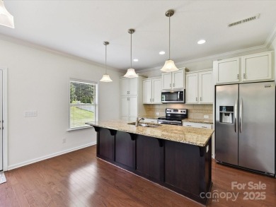 Welcome home to this spacious move-in 4 BR/2.5 bath home w/ on Stonebridge Golf Club in North Carolina - for sale on GolfHomes.com, golf home, golf lot