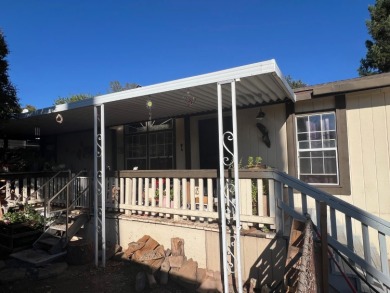 This home has three bedrooms, two bathrooms, a family room and a on The Club at Copper Valley Golf Course in California - for sale on GolfHomes.com, golf home, golf lot