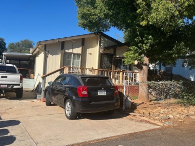 This home has three bedrooms, two bathrooms, a family room and a on The Club at Copper Valley Golf Course in California - for sale on GolfHomes.com, golf home, golf lot