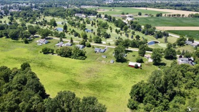 Discover the potential of this 2/3-bedroom ranch home situated on Dundee Golf Club in Michigan - for sale on GolfHomes.com, golf home, golf lot