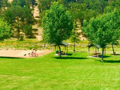 This home has three bedrooms, two bathrooms, a family room and a on The Club at Copper Valley Golf Course in California - for sale on GolfHomes.com, golf home, golf lot