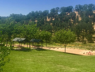 This home has three bedrooms, two bathrooms, a family room and a on The Club at Copper Valley Golf Course in California - for sale on GolfHomes.com, golf home, golf lot