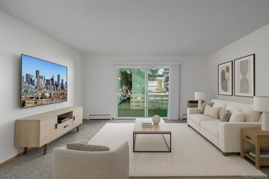 Step into this move in ready ground level condo in the heart of on Emerald Greens Golf Club in Colorado - for sale on GolfHomes.com, golf home, golf lot