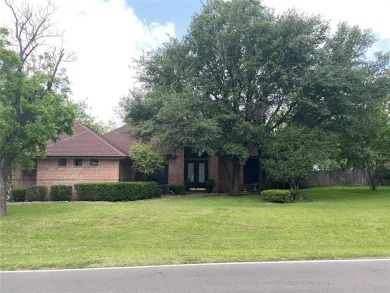 PECAN PLANTATION GEM nestled among mature trees on oversized lot for sale on GolfHomes.com
