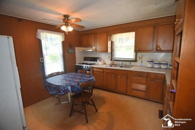 Discover the potential of this 2/3-bedroom ranch home situated on Dundee Golf Club in Michigan - for sale on GolfHomes.com, golf home, golf lot