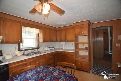 Discover the potential of this 2/3-bedroom ranch home situated on Dundee Golf Club in Michigan - for sale on GolfHomes.com, golf home, golf lot