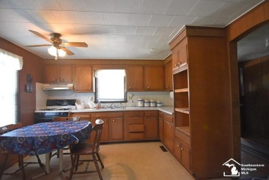 Discover the potential of this 2/3-bedroom ranch home situated on Dundee Golf Club in Michigan - for sale on GolfHomes.com, golf home, golf lot