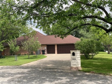 PECAN PLANTATION GEM nestled among mature trees on oversized lot on Pecan Plantation Country Club in Texas - for sale on GolfHomes.com, golf home, golf lot