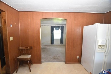 Discover the potential of this 2/3-bedroom ranch home situated on Dundee Golf Club in Michigan - for sale on GolfHomes.com, golf home, golf lot