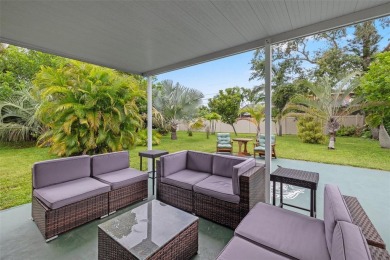 Tropical oasis in Northeast Park Shores! Two bedroom, two bath on The Renaisssance Vinoy Golf Club in Florida - for sale on GolfHomes.com, golf home, golf lot