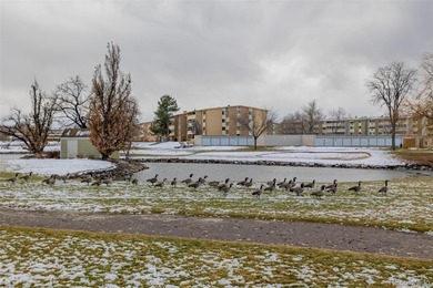 Step into this move in ready ground level condo in the heart of on Emerald Greens Golf Club in Colorado - for sale on GolfHomes.com, golf home, golf lot