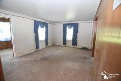 Discover the potential of this 2/3-bedroom ranch home situated on Dundee Golf Club in Michigan - for sale on GolfHomes.com, golf home, golf lot