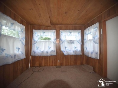 Discover the potential of this 2/3-bedroom ranch home situated on Dundee Golf Club in Michigan - for sale on GolfHomes.com, golf home, golf lot