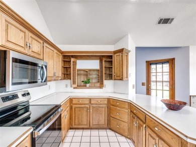 Welcome to this beautifully maintained 4-bedroom, 2-bath home on Earlywine Golf Course in Oklahoma - for sale on GolfHomes.com, golf home, golf lot